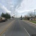 White folding table blocking Highway 99 lane