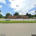 Male in distress in red car at Dollar General parking lot
