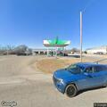 Person punched through vehicle window at gas station