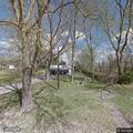 Complaint of brush burning in yard in Lenapah