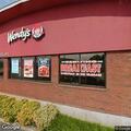 Customer points gun at fast food workers