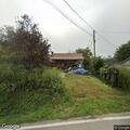 Rekindled house fire with propane tank explosions