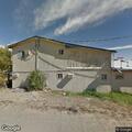 Woman with lower stomach pain near Price Street