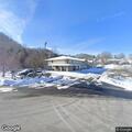 Officer checks two people near businesses