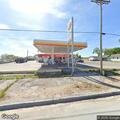 Driver reports tailgating SUV near gas station