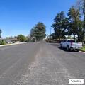 Person experiencing abdominal pain in Madera