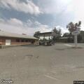 56-year-old man reports arm pain behind store