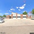 Female actively choking in vehicle near fire station