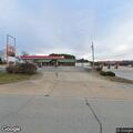 Female patient with shallow breathing at gas station