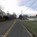 Woman with chest pain and breathing difficulty near river street