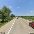 Woman yelling at people along roadway near Tipton