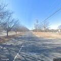 Vehicle debris blocking lanes on Freeman Mill Road