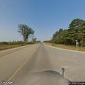 Officer stops semi truck for road hazard