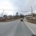 Overturned vehicle crash near Main Street and river