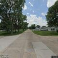 Officer responding to code violation at residence