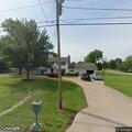 Lawn mower fire at Baxter Springs residence