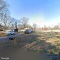 Brush pile and trash fire reported on Patriot Street