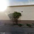 Person on bike hit by vehicle in parking lot