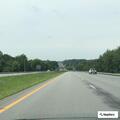 Reckless driver swerving and hitting guardrail