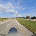 Erratic white pickup driving east on Highway 60
