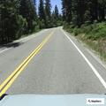 Reckless blue SUV passing on double yellow line