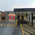 Crash with injuries at restaurant parking lot