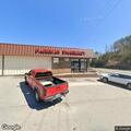 Man groaning and lying on ground after shooting