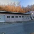 Female having a seizure at auto parts store in Pound
