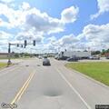 Traffic lights flashing red at highway intersection