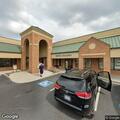 Unconscious woman vomiting at dialysis center
