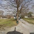 Woman outside home crying and seeking a ride