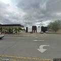 Person passed out behind wheel at gas station