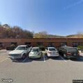 Parked vehicle hit at Meadowbrook Library