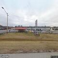 Suspicious sedan reported behind hardware store