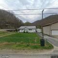 Man outside home after fight, shows knife sheath