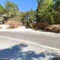Motorcycle crash with injured rider off roadway