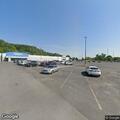 Woman with chest pain in silver Cadillac at Goodwill parking lot
