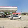 Officer monitors vehicle at gas station