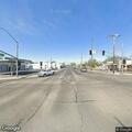 Grass fire under bridge near East 16th Street