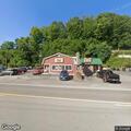 Two-car crash in restaurant parking lot, no injuries