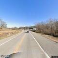 Suspicious truck following ambulance on US 63