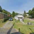 Caller reports person at vacant house on Ramey Street