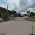 Van reportedly runs over woman in parking lot