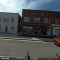 Loose dog chasing customers near business