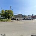 Man in hospital clothes acts erratically near Corner Market
