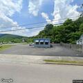 Intoxicated woman walking in roadway near Pizza Plus