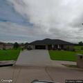 Neighbor parking vehicle in yard during property sale