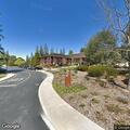 Burglary alarm and open door at office building