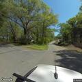 Person experiencing back pain at Douglas Road