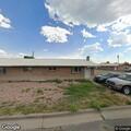 Loose dog with rope on neck near 14th Street in Alamosa